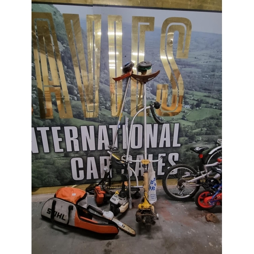 812 - 3 petrol strimmers and a Stihl chainsaw