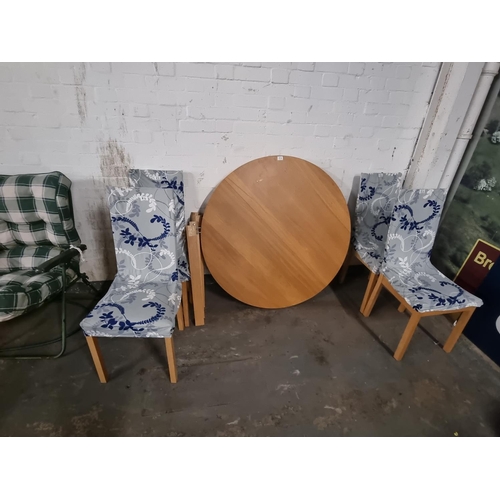 814 - Pine effect dining table and 4 chairs