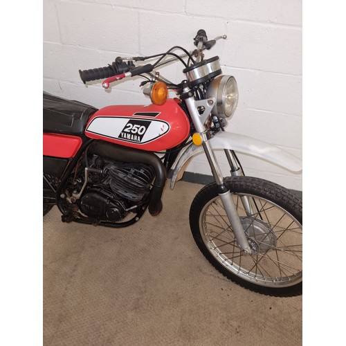 A 1975 Yamaha DT 250 Enduro fairly complete and a good