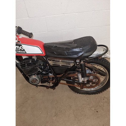 A 1975 Yamaha DT 250 Enduro fairly complete and a good