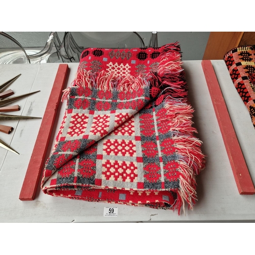 59 - A double sided pink Welsh woollen blanket