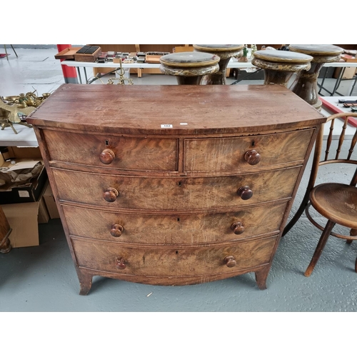 102 - A mahogany bow fronted two over three chest of drawers