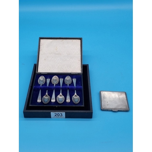 203 - A boxed set of six hallmarked silver teaspoons and a hallmarked silver cigarette case