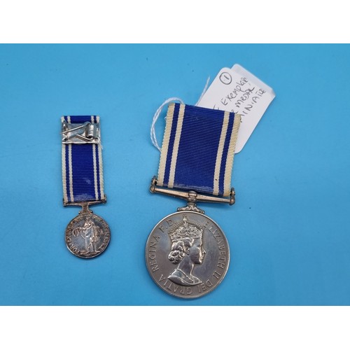 238 - A Police Exemplary Service Medal and miniature in original medal box - EIIR