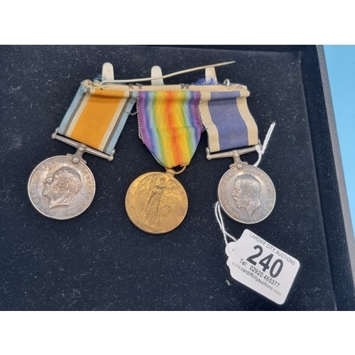 240 - A group of three medals awarded to PTE H. R. Lynch 67377. The Long Service and Good Conduct George I... 