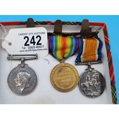 242 - A group of three medals - The George V Long Service and Good Conduct Medal J54907, H.J. Lynch, P.O.T... 