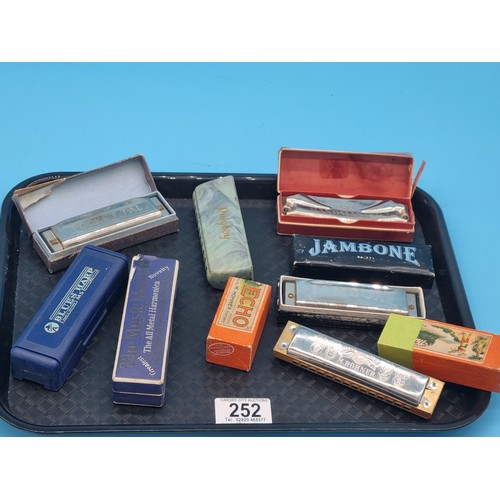 252 - Seven vintage harmonicas to include Jambone, Echo, Blues, Harp, etc