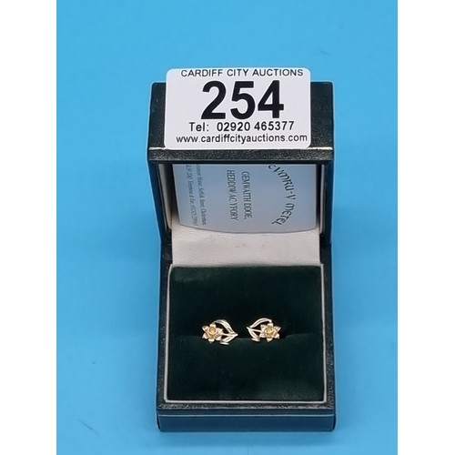 254 - A pair of 9k gold Cymru - y Metel Welsh gold earrings - hallmarked in original box with certificate