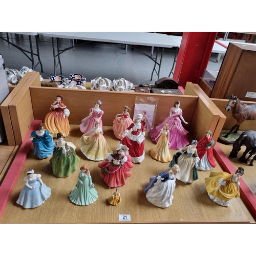 21 - Seventeen Coalport and Royal Doulton figurines