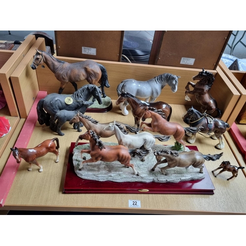 22 - A selection of horse figurines to include Beswick, Leonardo collection, etc