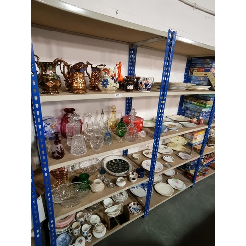 427 - 8 Shelves of household items to include glassware, china, vases, etc