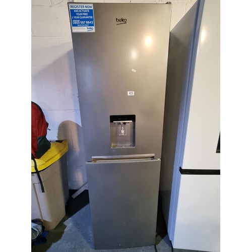 473 - A Beko fridge freezer with water dispenser