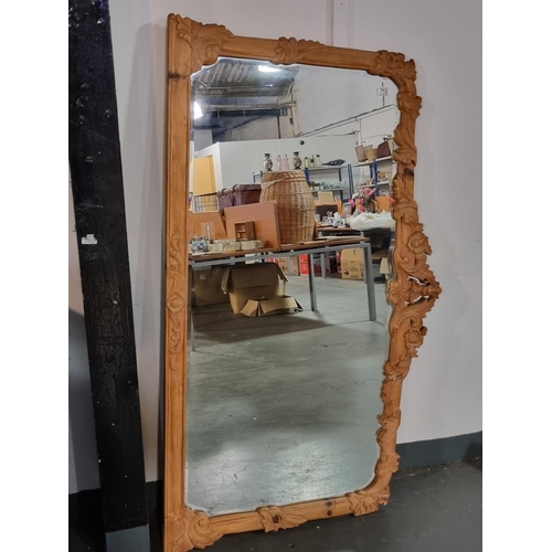 713 - A large wall mirror