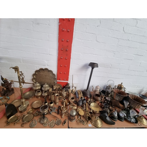3 - A large quantity of brass, copper and other metalware including signed brass Chinese pots, cast iron... 