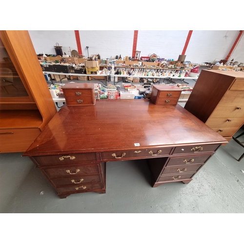 103 - A mahogany twin pedestal desk