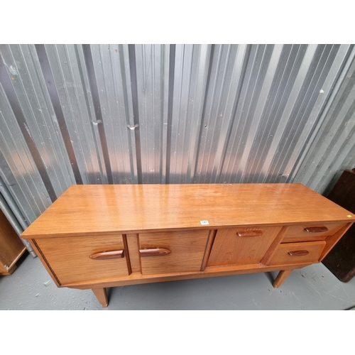 147 - A teak Mid Century sideboard