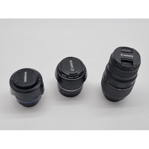 260 - A Samsung D-Xenon 18-55, a Canon zoom lens EF-5 18-55mm and a Sigma DG 70-300mm zoom