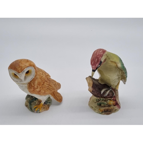 268 - An early large Beswick Owl and a Woodpecker - both in perfect condition - approx 8 inches high