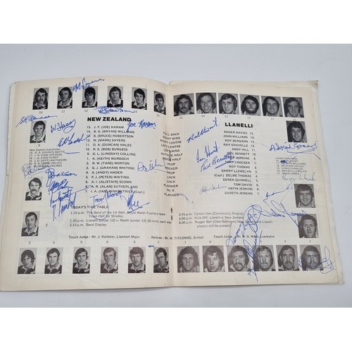 199 - A 1972 Llanelli V New Zealand rugby programme complete with the signatures of the All Black squad an... 