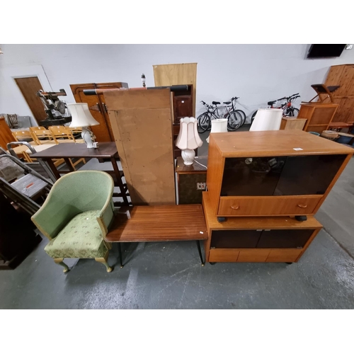 561 - 2 x teak TV units, a coffee table and a wicker chair