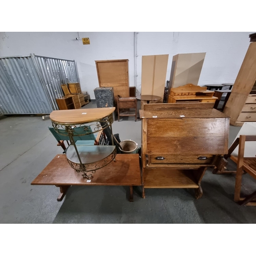 568 - An oak bureau, an oak coffee table and a metal side table