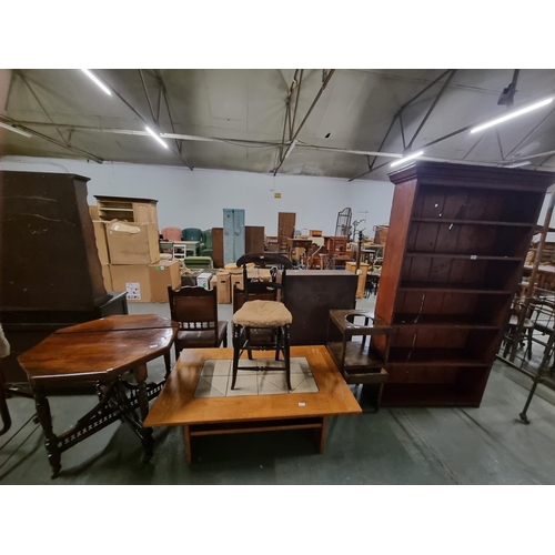 605 - A mahogany bookcase, oak pot cupboard, pine tile top table, etc