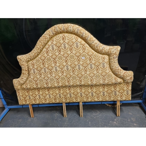 647 - An upholstered double headboard