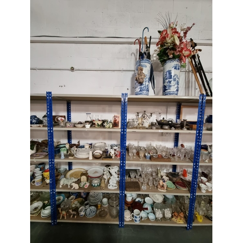 710 - 10 Shelves of household items to include glassware, china, metalware, vases, lamps, etc