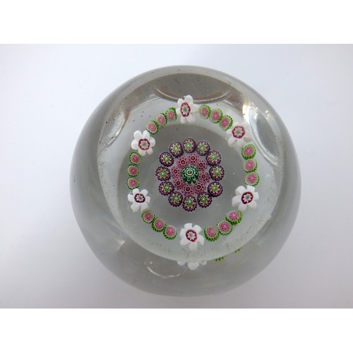 65 - Antique Clichy facet cut open concentric millefiori paperweight, circa 1850.
Diameter 6.5cm