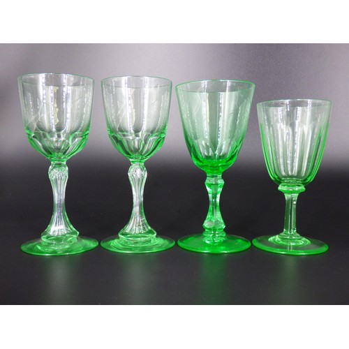 73 - Victorian eight assorted green uranium glass wine glasses, 7 cut.
Heights 11.5 to 14cm