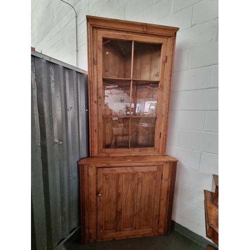 135 - A pine corner cabinet