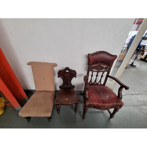 113 - A nursing chair, hall chair and an armchair