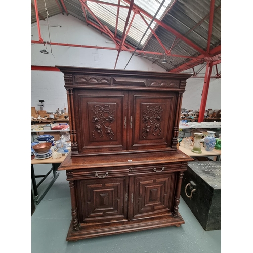 106 - A carved oak dresser/sideboard