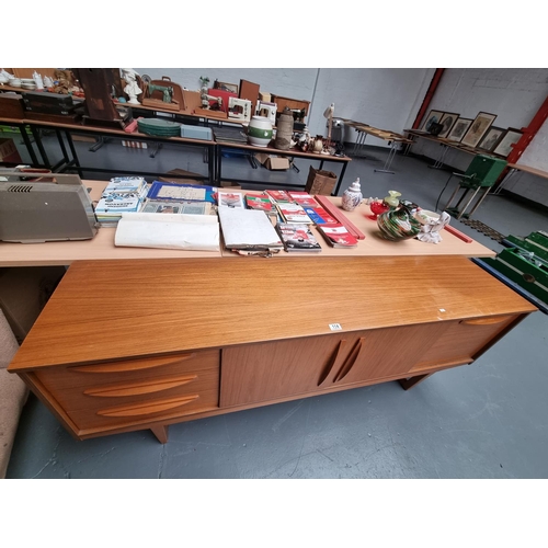 114 - A mid century teak sideboard