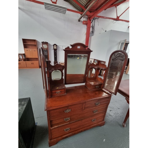 128 - A mahogany triple mirror dressing chest