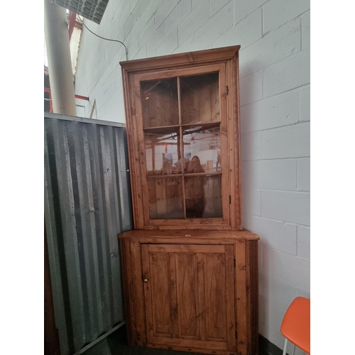 135 - A pine corner cabinet