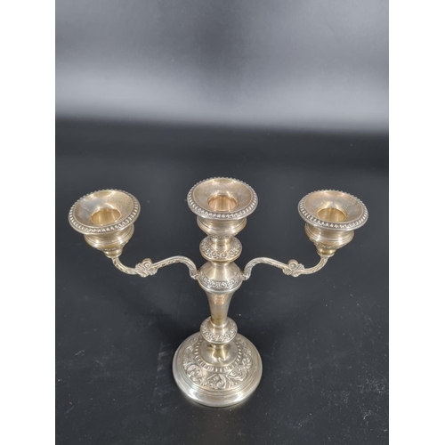 216 - A hallmarked silver 3 candle candelabra - height 9 inches (acceptable repair at the base). Weight in... 