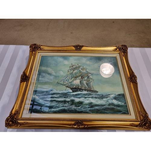 113 - A framed oil on canvas (under glass) painting of a sailing ship - signed but not recognised - 20 inc... 