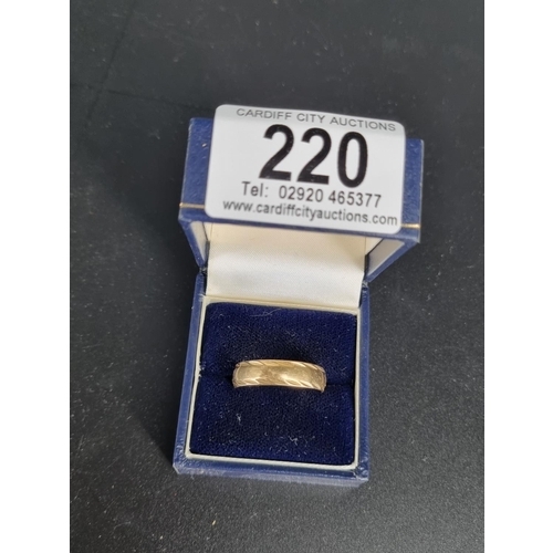 220 - A 9k gold band/ring (3.7 grams)