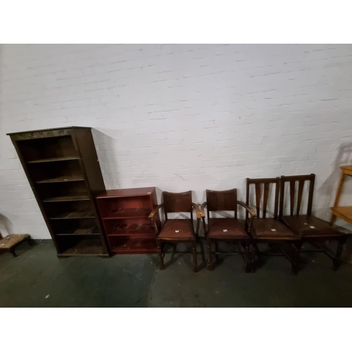 306 - 4 Oak dining chairs, an oak bookcase and a mahogany bookcase