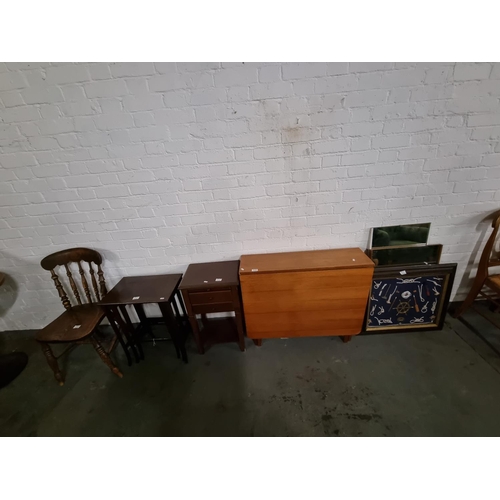 314 - A teak drop leaf dining table, a mahogany nest of tables, a bedside cabinet, an oak chair, etc