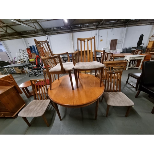 345 - A G Plan teak table and 6 chairs including 2 carvers