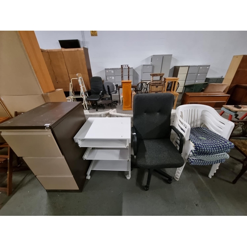 357 - A metal filing cabinet, a metal desk, an office chair, 4 plastic garden chairs, etc