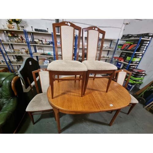 432 - A teak McIntosh dining table and 4 Stag chairs