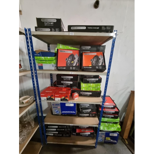 437 - A collection of boxed new car parts to include clutch kits, timing chain kits, etc