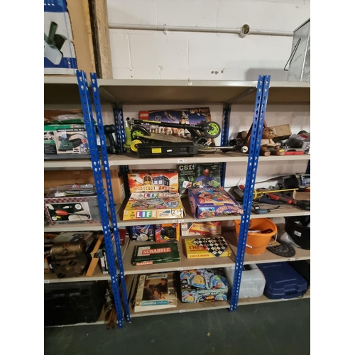 443 - 4 Shelves of toys and games to include a scooter, Lego, Harry Potter Lego, etc