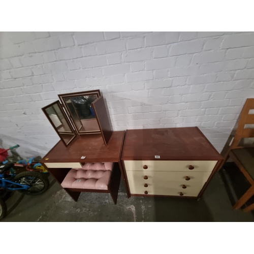 447 - A mahogany chest of drawers and matching dressing table with mirror and stool, etc