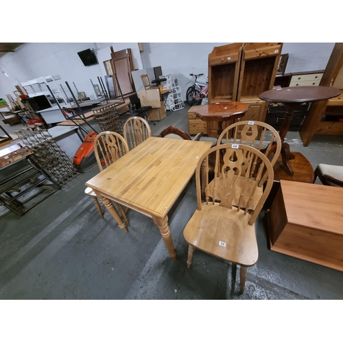 458 - A pine dining table and 4 chairs