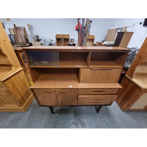 463 - A mahogany highboard