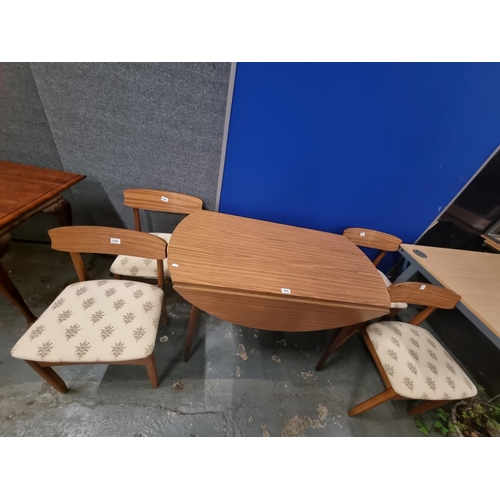 468 - A drop leaf dining table and 4 chairs